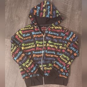 Feathers Kids Hoodie with Vibrant Text Design
